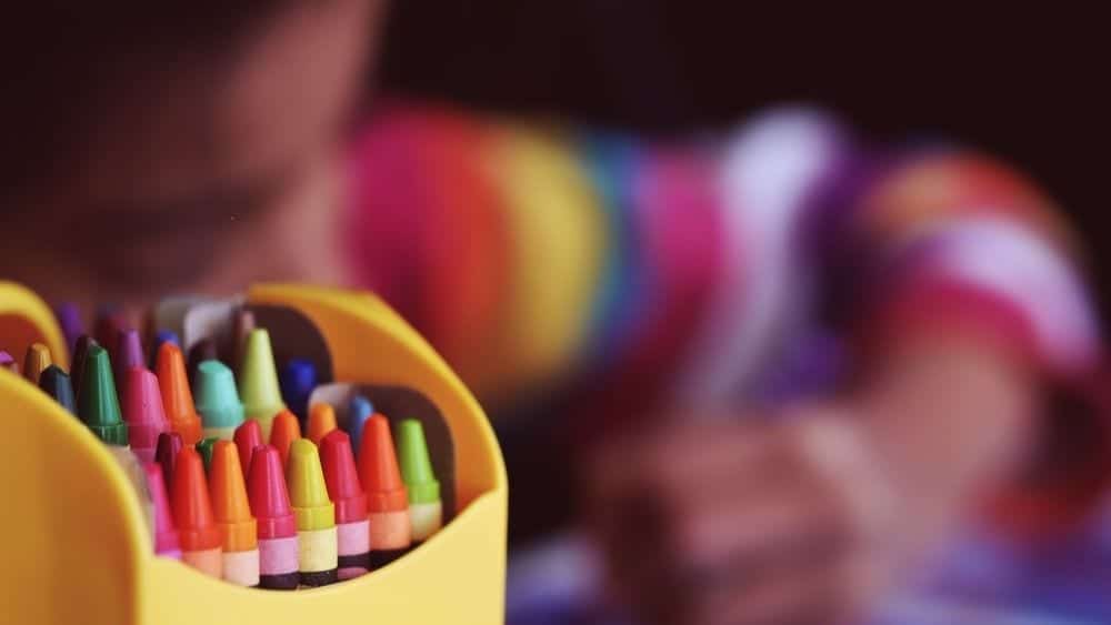 child with crayons