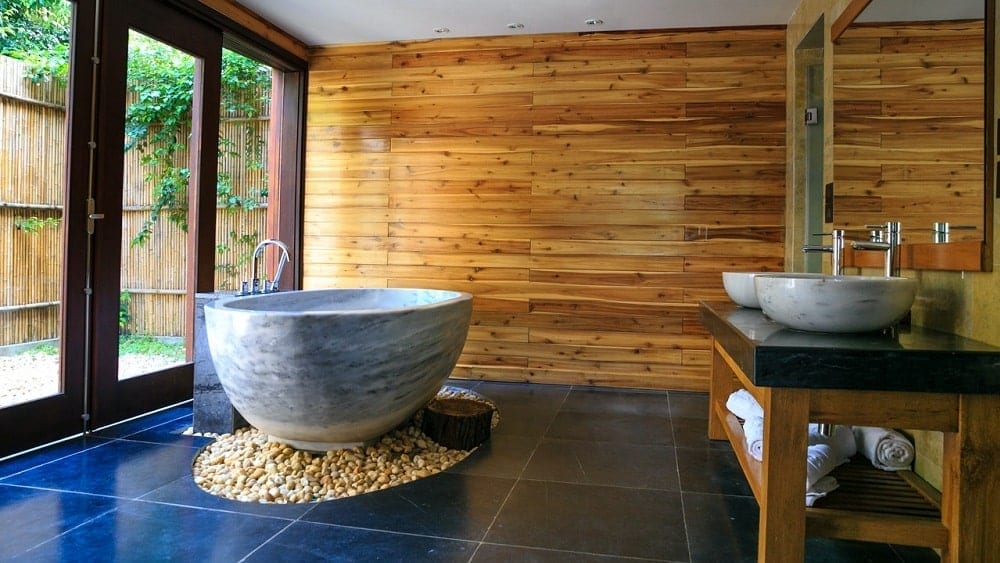 Spa-like bathroom retreat with double vanity and freestanding tub.