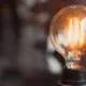 Close shot of a lit lightbulb.