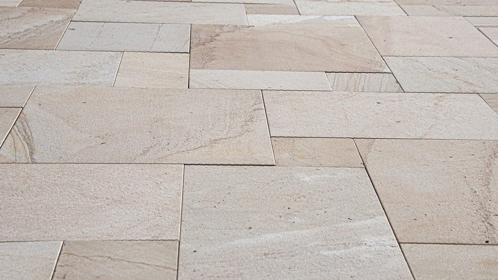 Close shot of stone tile flooring.