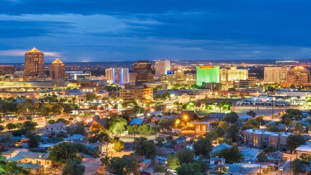 Downtown Albuquerque lit up in the evening.
