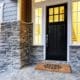 Entryway with stone siding.