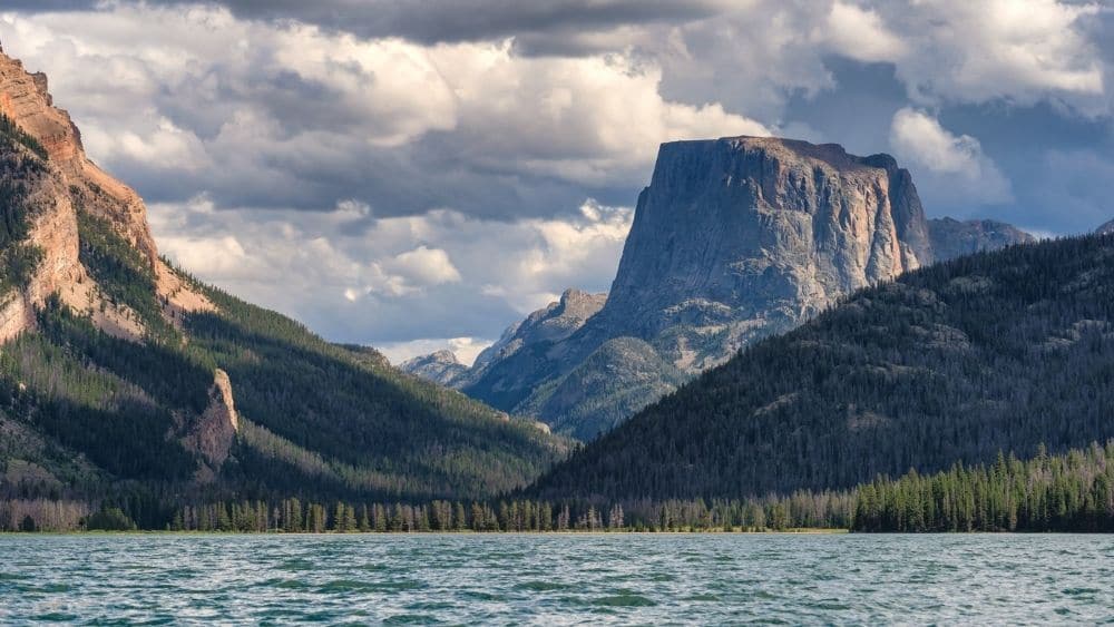 Green River Lake in Wyoming with a view of mountains in the background.