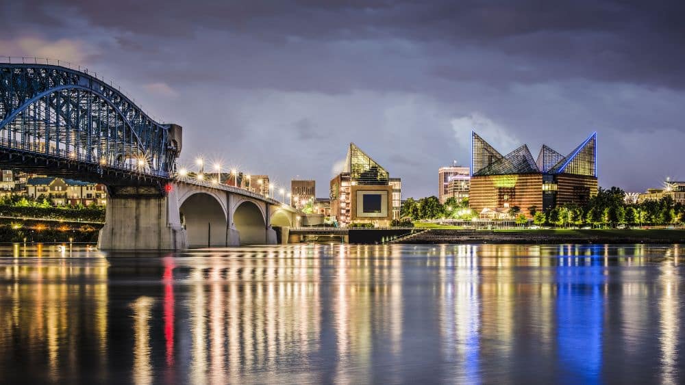 View from the Tennessee River of the Chattanooga, Tennessee skyline at night.
