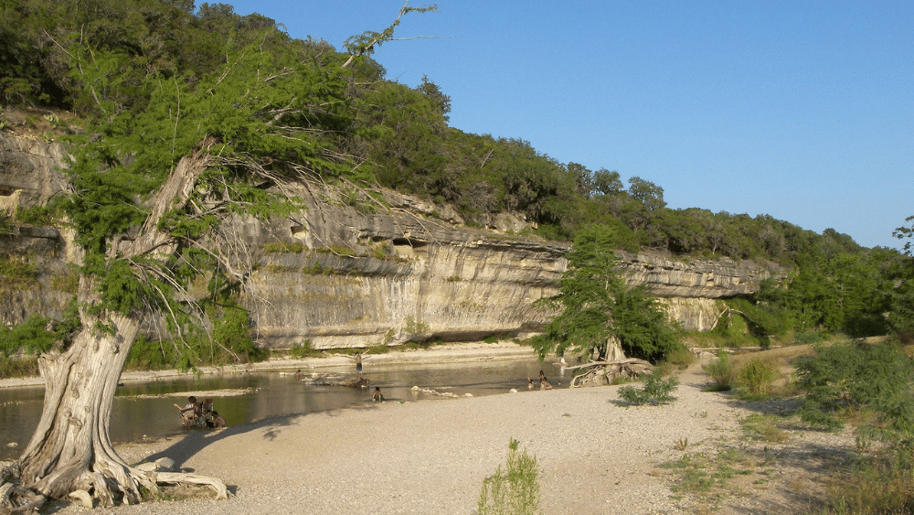 View of bluffs and river at Guadalupe River State Park, Texas.