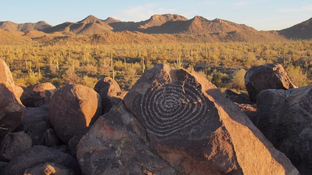 Image of spiral petroglyph attributed to the Hohokam people on Signal Hill in Saguaro National Park outside of Tucson, Arizona
